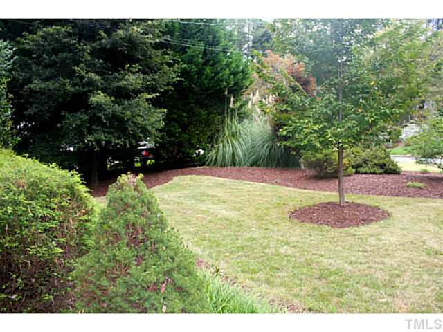 5009 Raintree Court Raleigh, NC 27609 - Photo 2 of 23 a swimming pool with yard