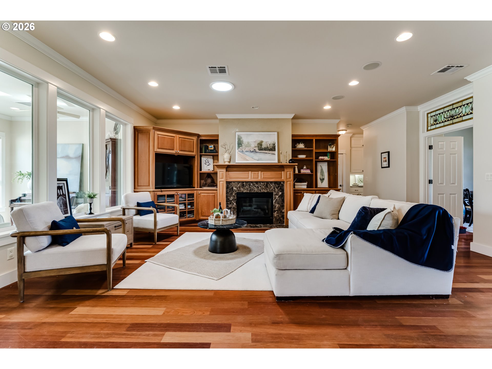 34386 Mathews Road Eugene, OR 97405 - Photo 28 of 48 a living room with furniture bathtub and a fireplace