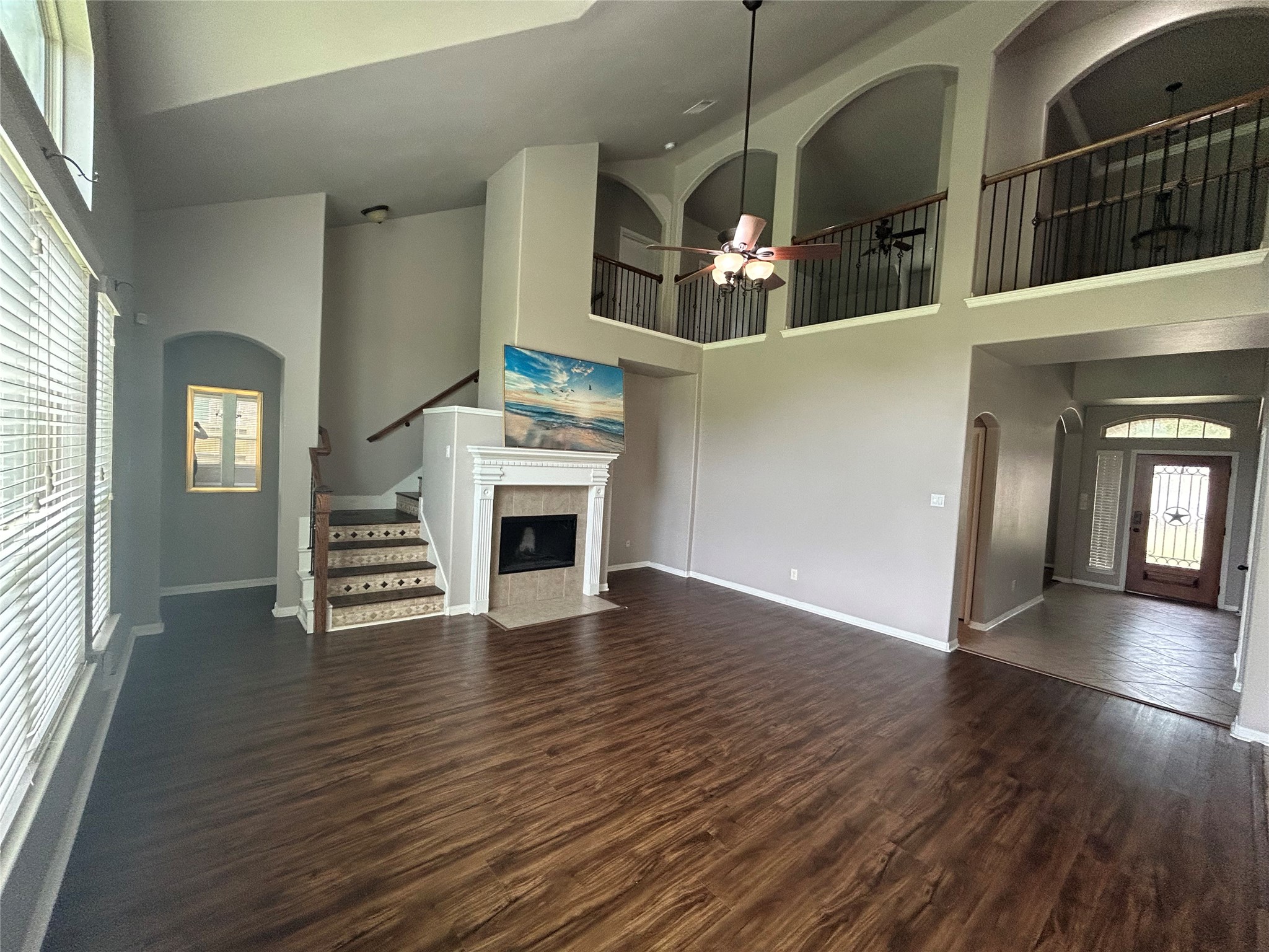 7936 Lake Commons Drive Rosenberg, TX 77469 - Photo 7 of 33 a view of empty room with wooden floor