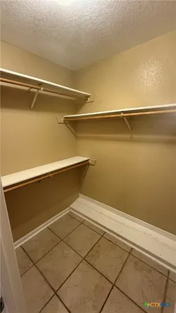 a bathroom with a bath tub and shower