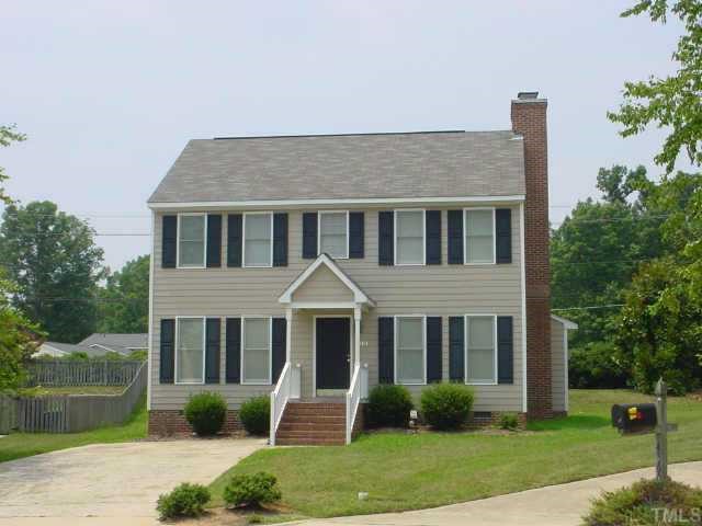 4304 Warfield Place Raleigh, NC 27604 - Photo 1 of 1 a front view of a house with garden