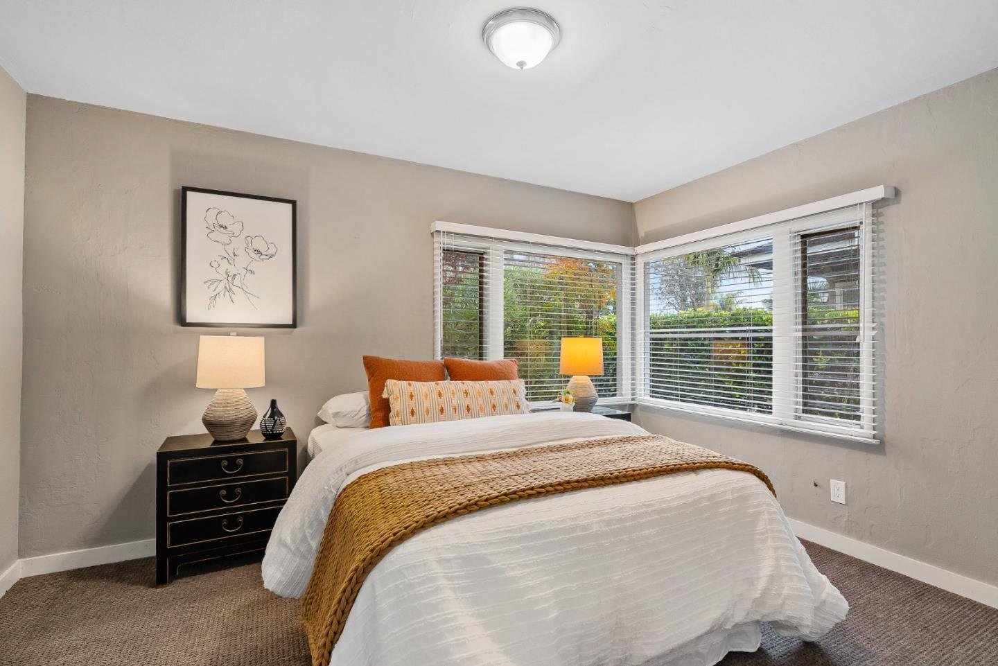 214 Martin Drive Aptos, CA 95003 - Photo 11 of 33 a bed sitting in a bedroom next to a window