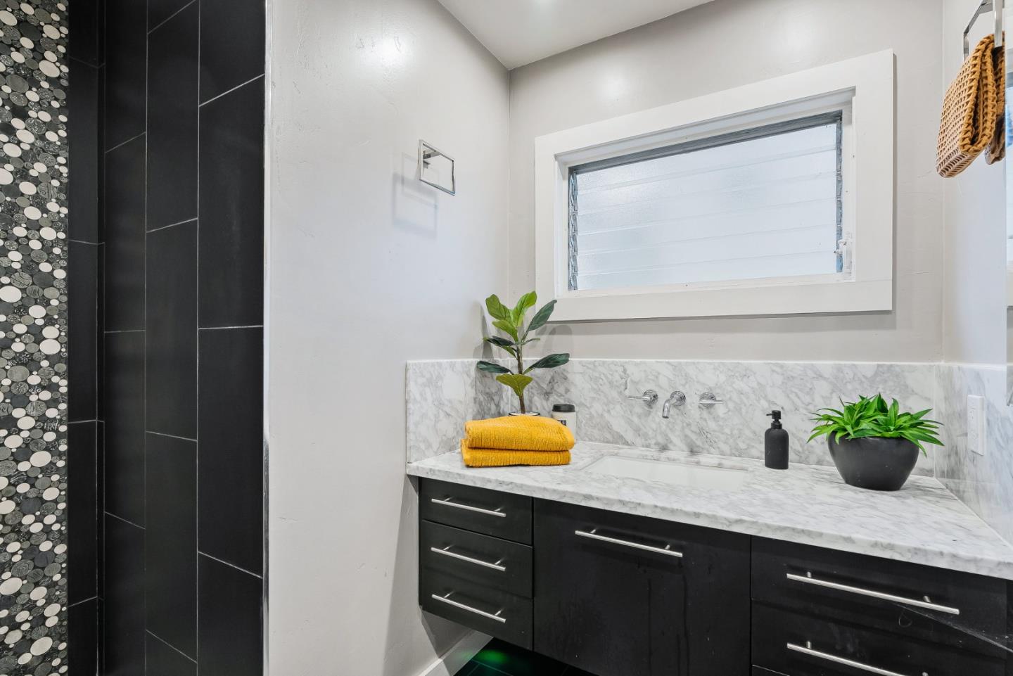 214 Martin Drive Aptos, CA 95003 - Photo 14 of 33 a bathroom with a granite countertop sink a potted plant and a window