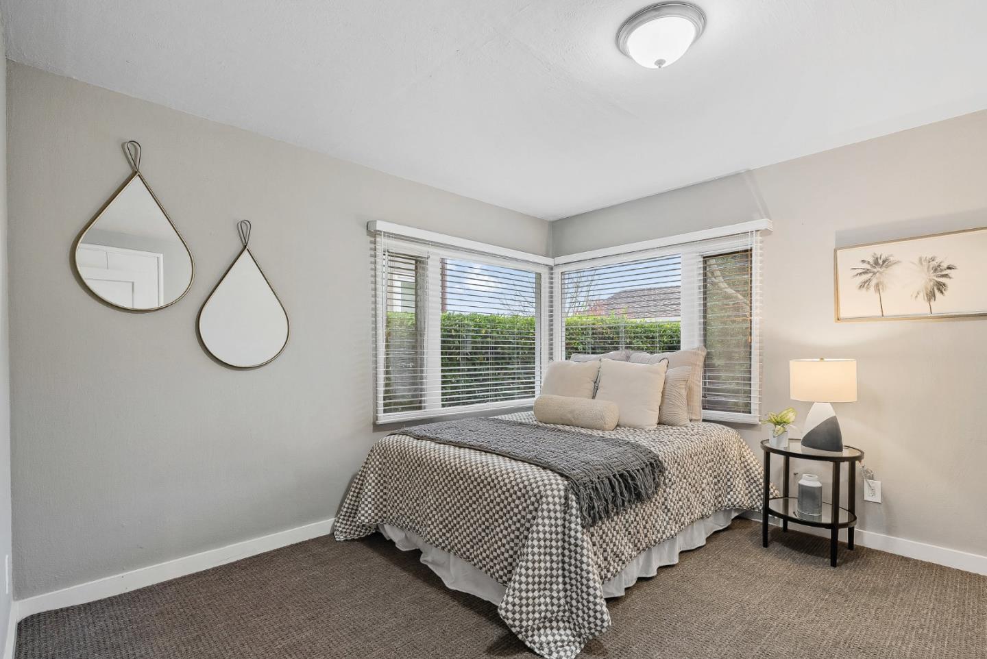 214 Martin Drive Aptos, CA 95003 - Photo 16 of 33 a bed sitting in a room next to a window