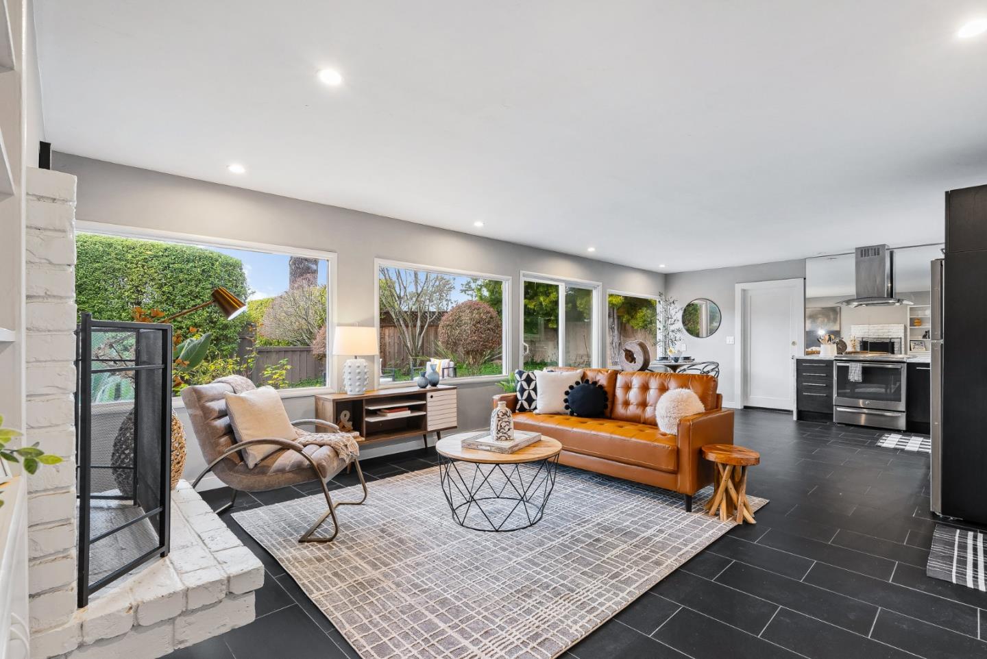 214 Martin Drive Aptos, CA 95003 - Photo 2 of 33 a living room with furniture fireplace and a table