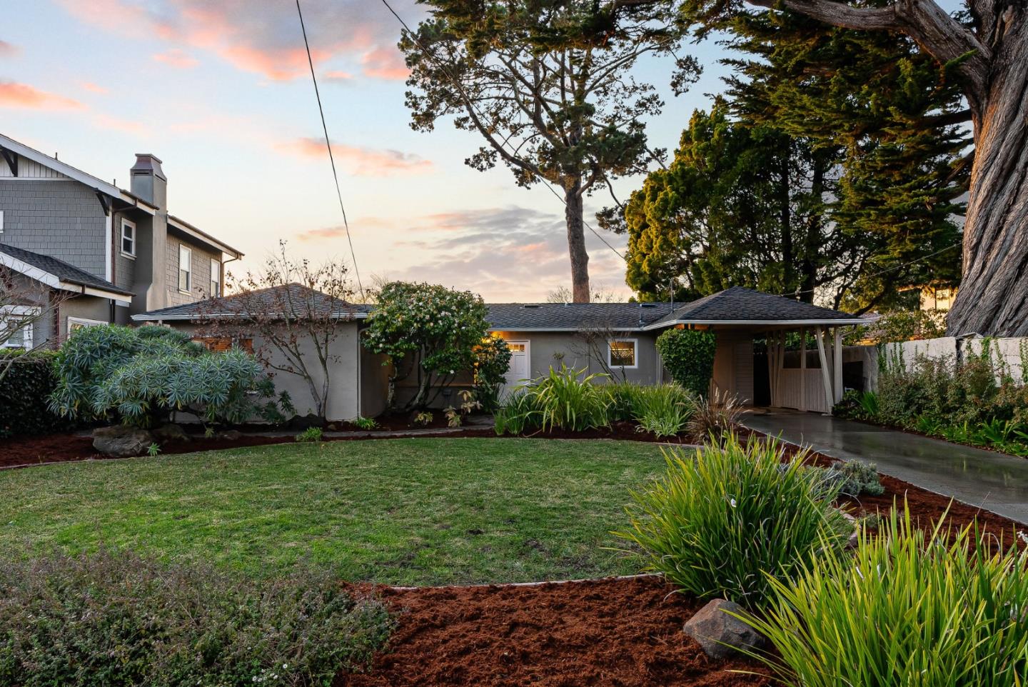 214 Martin Drive Aptos, CA 95003 - Photo 27 of 33 a front view of a house with a garden
