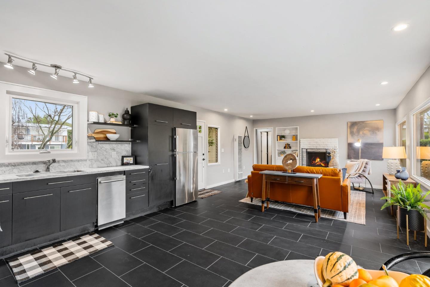 214 Martin Drive Aptos, CA 95003 - Photo 9 of 33 a living room with fireplace furniture and a window