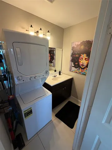 a room with furniture and mirror