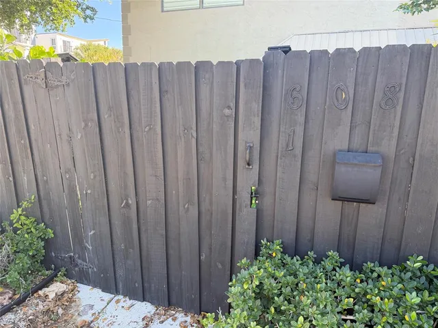 a view of a wooden fence with a wooden fence