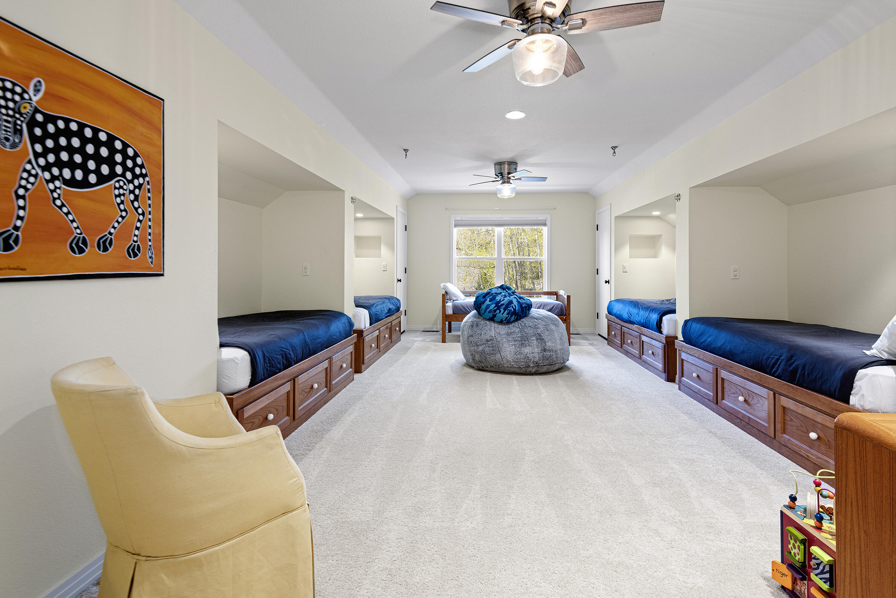 16775 Pony Express Way Bend, OR 97707 - Photo 20 of 38 a living room with furniture a couch and a chandelier