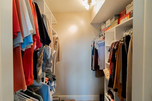 a view of a two chairs in the balcony