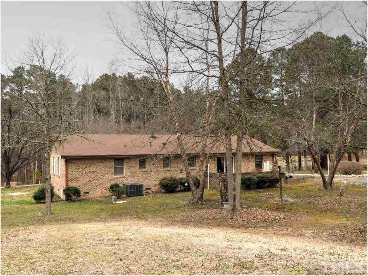 1566 Northside Road Creedmoor, NC 27522 - Photo 20 of 24 Rear view of ranch and lot