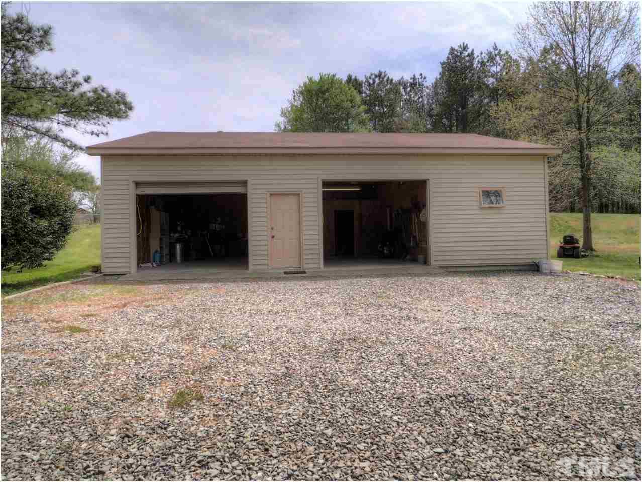 1566 Northside Road Creedmoor, NC 27522 - Photo 23 of 24 front view of garage/shop --other overhead door on side