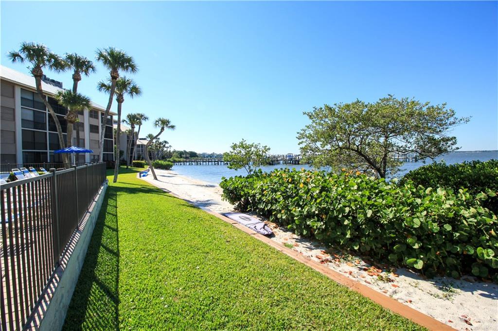 4540 Northeast Sandpebble Trace, Unit 203 Jensen Beach, FL 34957 - Photo 4 of 10 a view of a garden from a balcony