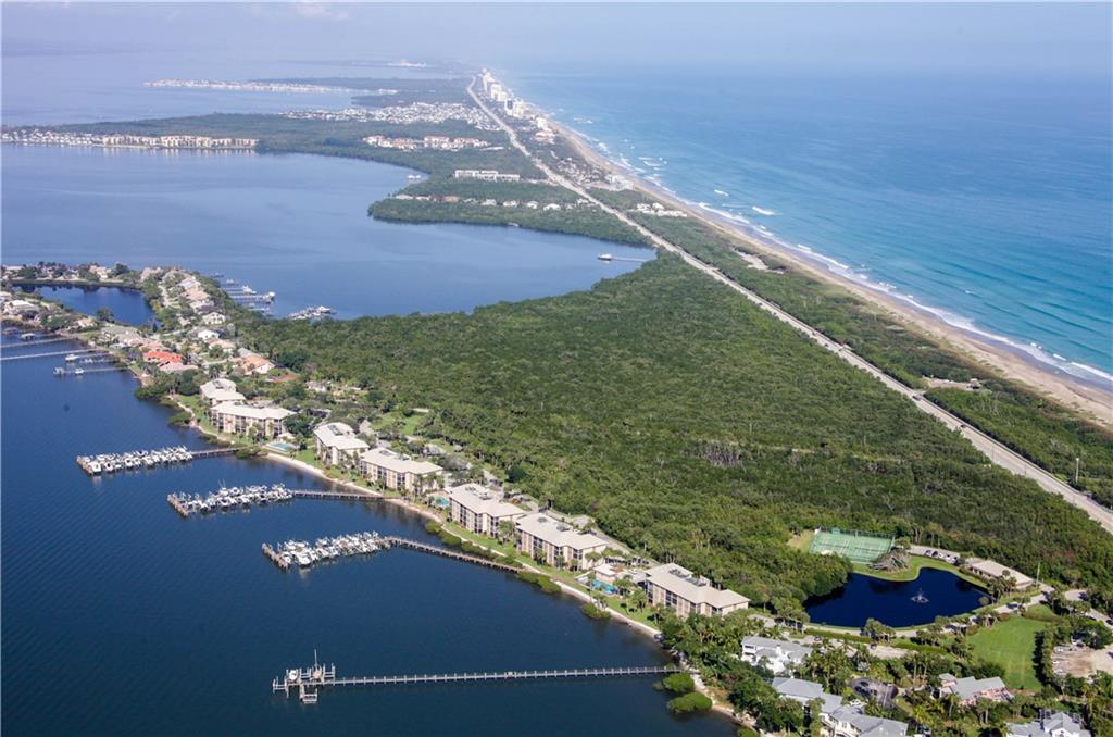 4540 Northeast Sandpebble Trace, Unit 203 Jensen Beach, FL 34957 - Photo 10 of 10 a view of lake from a balcony