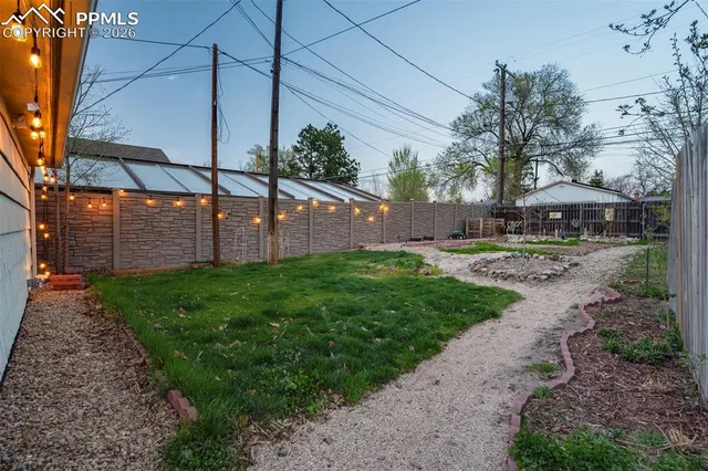 a view of a backyard with a garden
