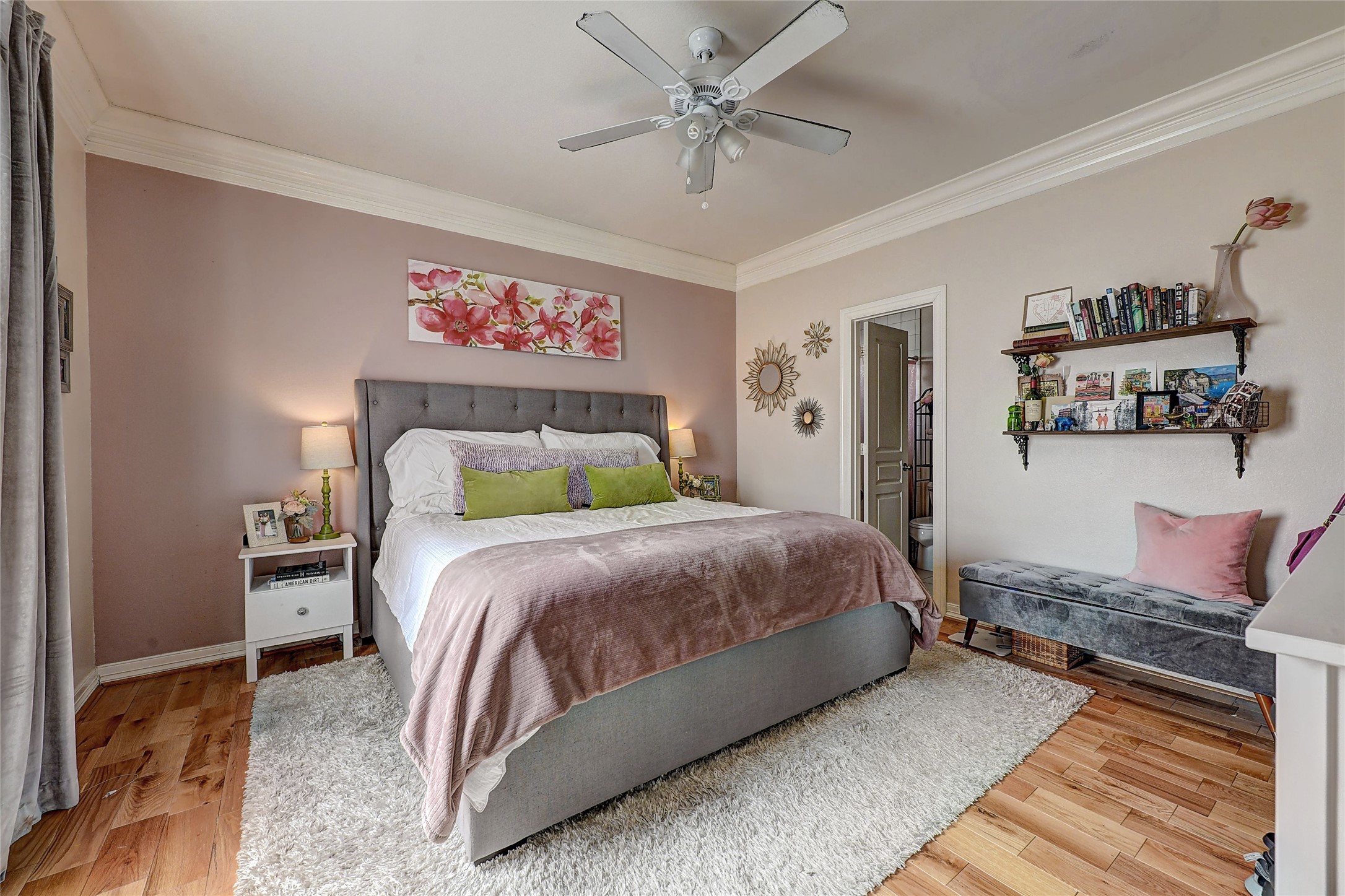 835 Rosine Street Houston, TX 77019 - Photo 14 of 18 a bedroom with a bed and dresser