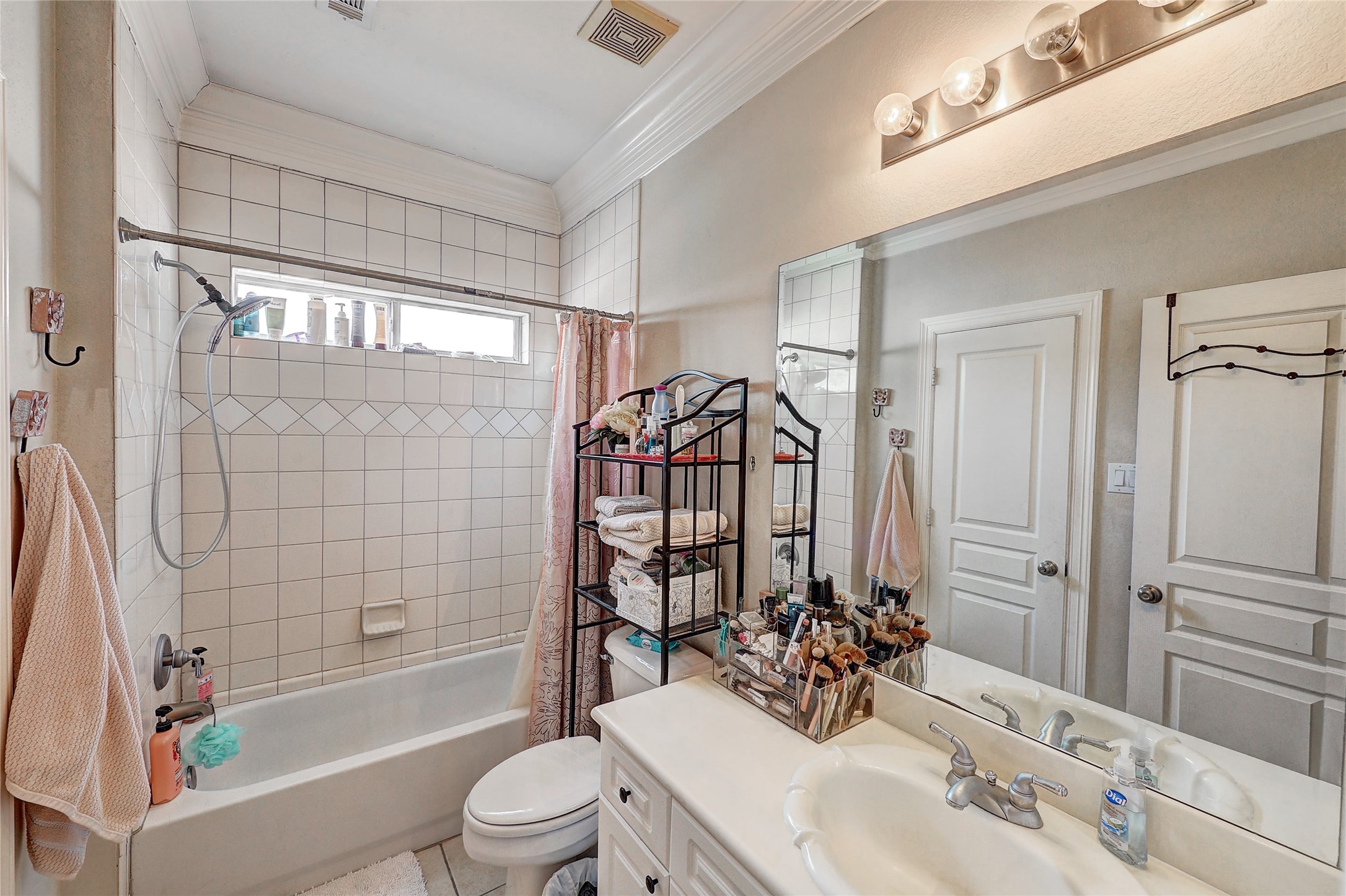 835 Rosine Street Houston, TX 77019 - Photo 15 of 18 a bathroom with a sink a toilet and shower