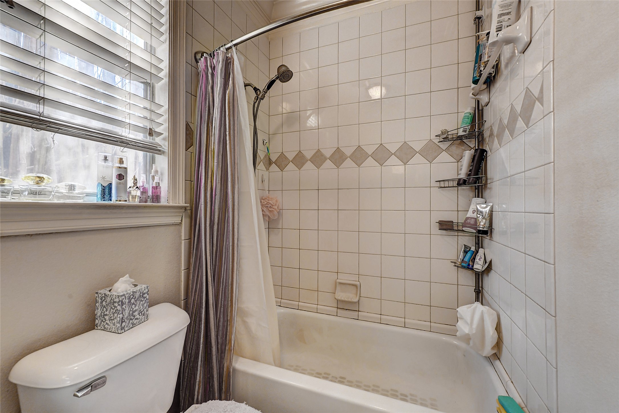 835 Rosine Street Houston, TX 77019 - Photo 4 of 18 a bathroom with a toilet and shower