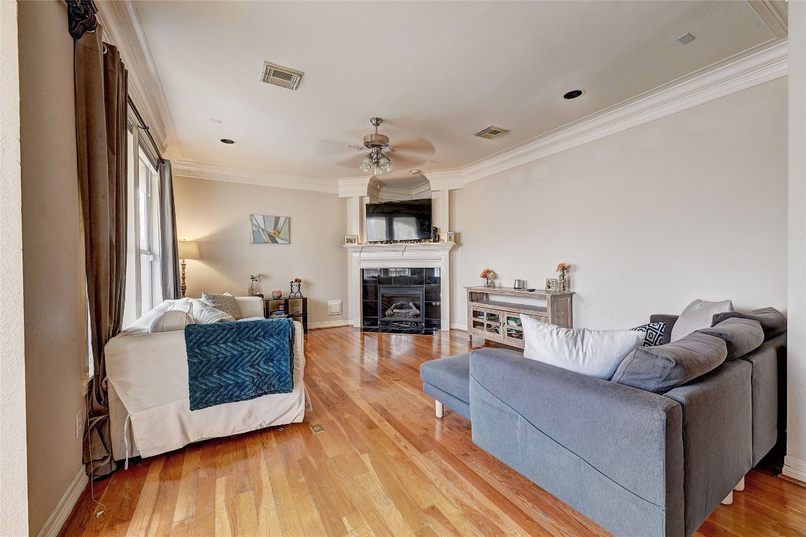 835 Rosine Street Houston, TX 77019 - Photo 7 of 18 a living room with furniture and a fireplace