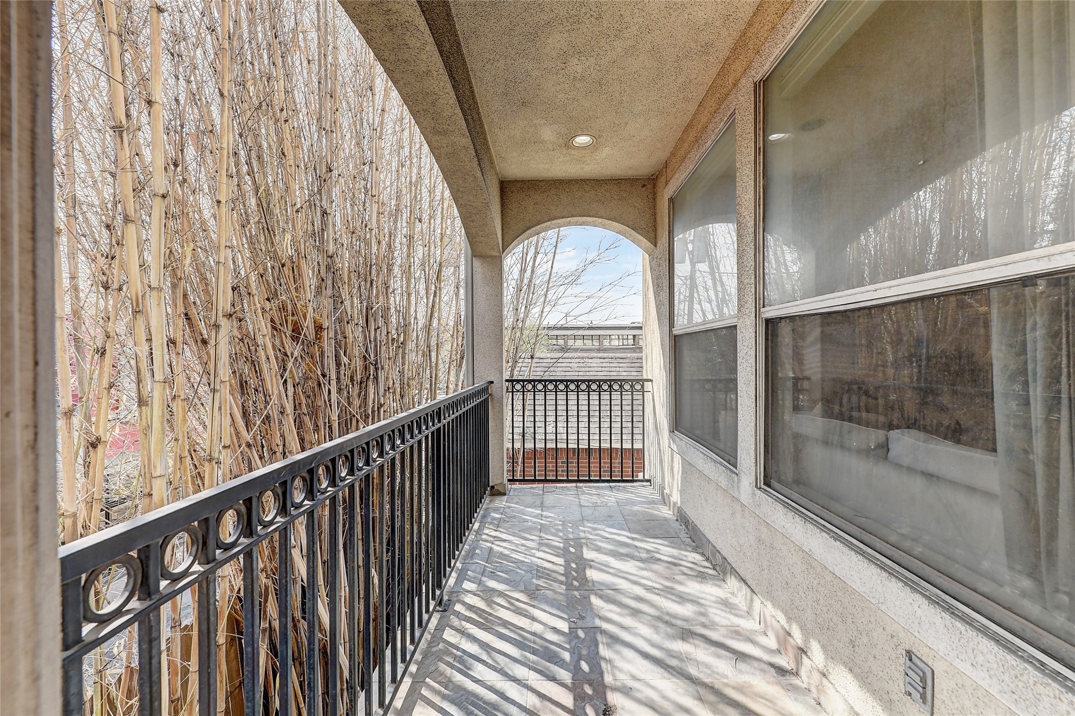 835 Rosine Street Houston, TX 77019 - Photo 8 of 18 a view of a room with wooden floor and door