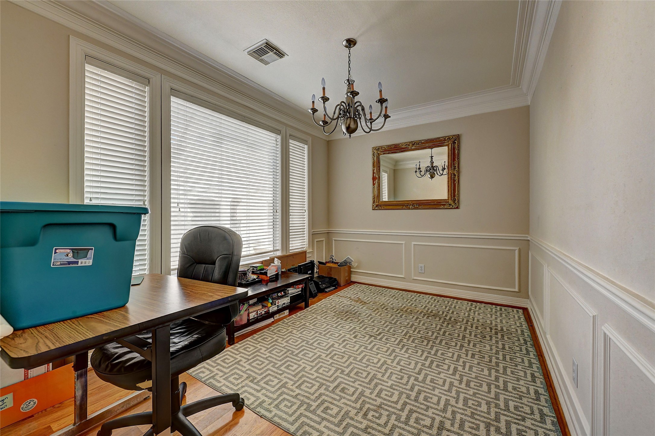 835 Rosine Street Houston, TX 77019 - Photo 9 of 18 a bedroom with furniture and a window