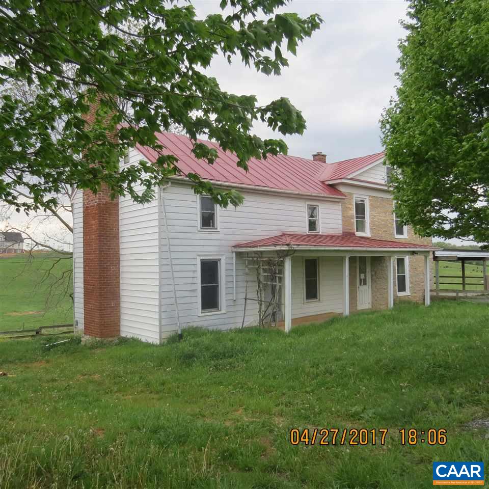1033 Kiddsville Road Waynesboro, VA 22980 - Photo 1 of 33 a front view of a house with a garden