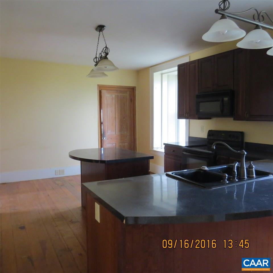 1033 Kiddsville Road Waynesboro, VA 22980 - Photo 12 of 33 a kitchen with a sink counter top space and cabinets