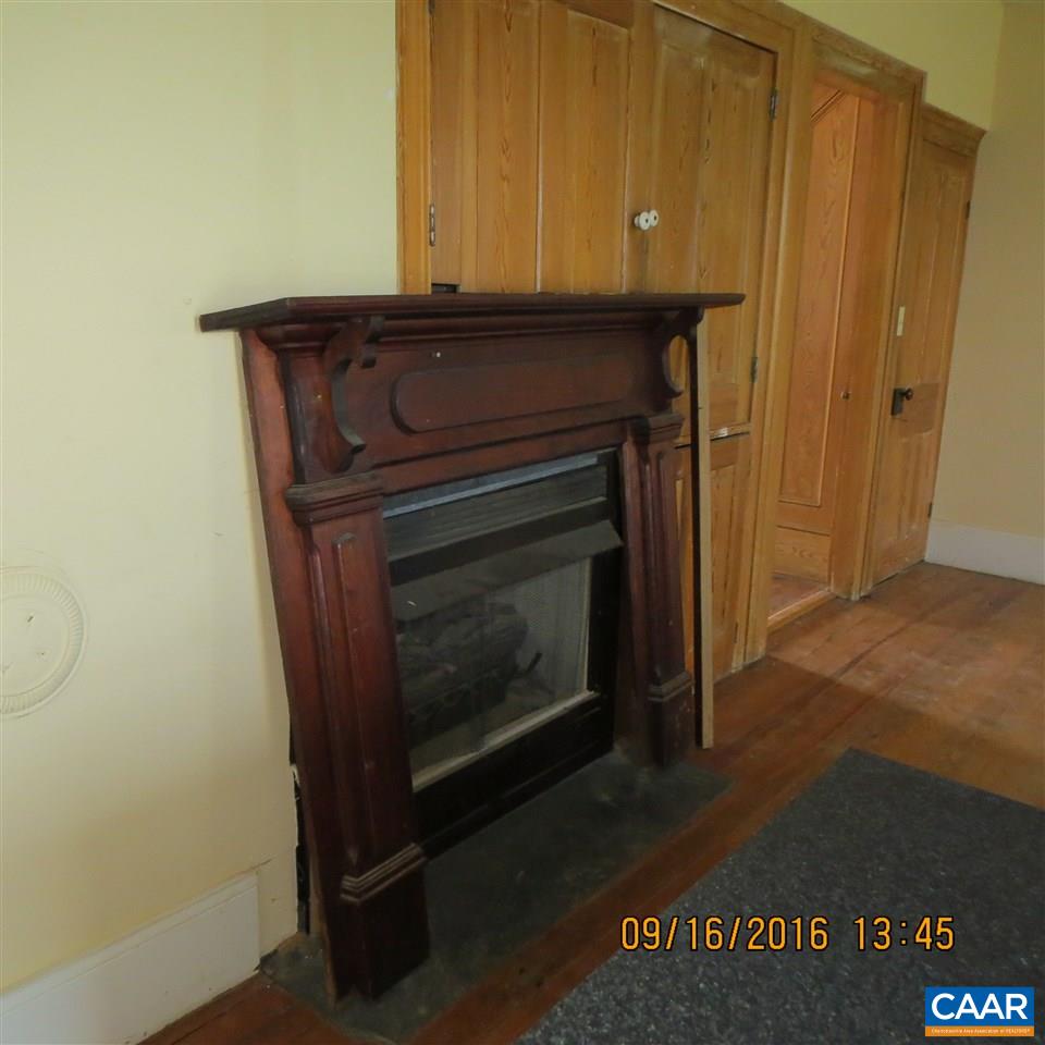 1033 Kiddsville Road Waynesboro, VA 22980 - Photo 13 of 33 a stove top oven sitting inside of a kitchen