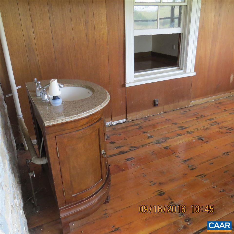 1033 Kiddsville Road Waynesboro, VA 22980 - Photo 19 of 33 a bathroom with a sink and a mirror