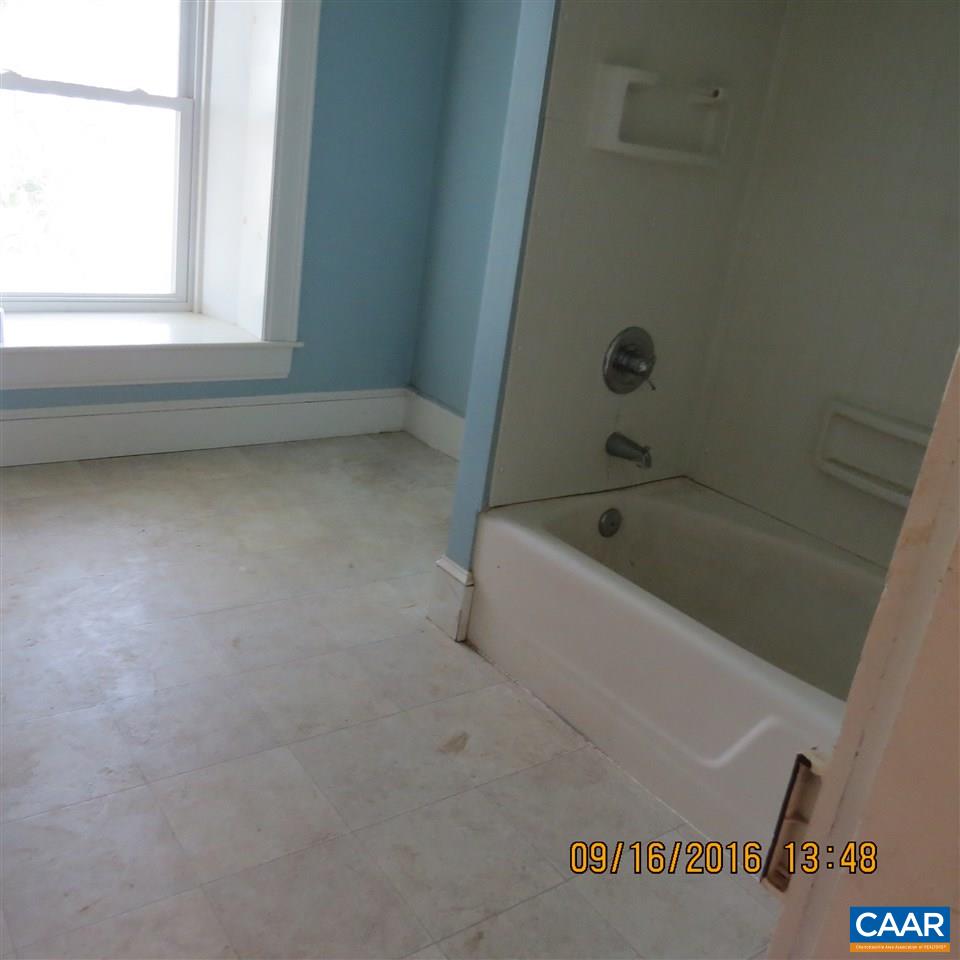 1033 Kiddsville Road Waynesboro, VA 22980 - Photo 26 of 33 a white bath tub sitting next to a window