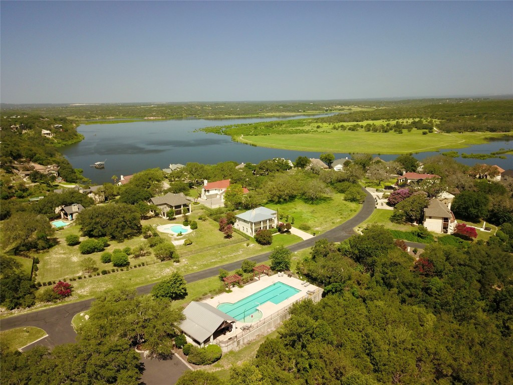 637 Wesley Ridge Drive Spicewood, TX 78669 - Photo 18 of 26 Residents enjoy a large pool, tennis courts, plus a scenic waterfront park.