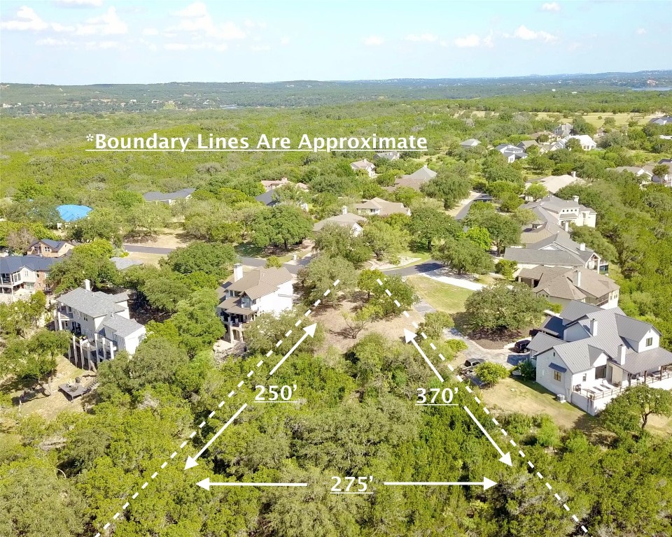 637 Wesley Ridge Drive Spicewood, TX 78669 - Photo 8 of 26 Positioned between two beautiful custom residences, offering the perfect setting for your own. *Boundary lines are approximate.