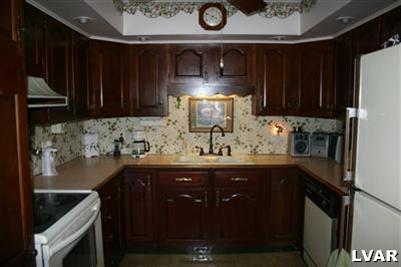 1046 Miller Road Nazareth, PA 18064 - Photo 20 of 33 a kitchen with a sink and cabinets