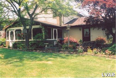 1046 Miller Road Nazareth, PA 18064 - Photo 2 of 33 a front view of house with yard and green space