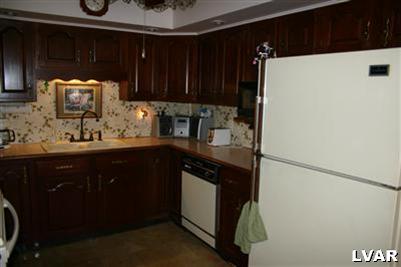 1046 Miller Road Nazareth, PA 18064 - Photo 21 of 33 a kitchen with a sink and cabinets