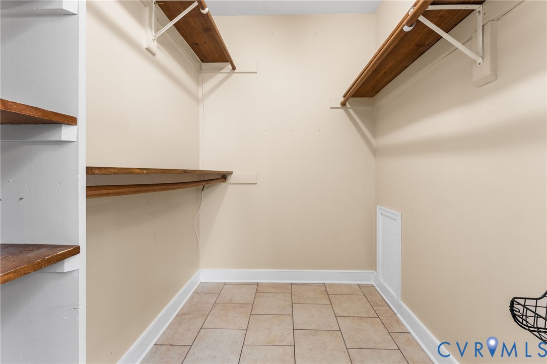 12601 Cottage Mill Road Midlothian, VA 23114 - Photo 38 of 38 Walk in closet featuring light tile patterned floo