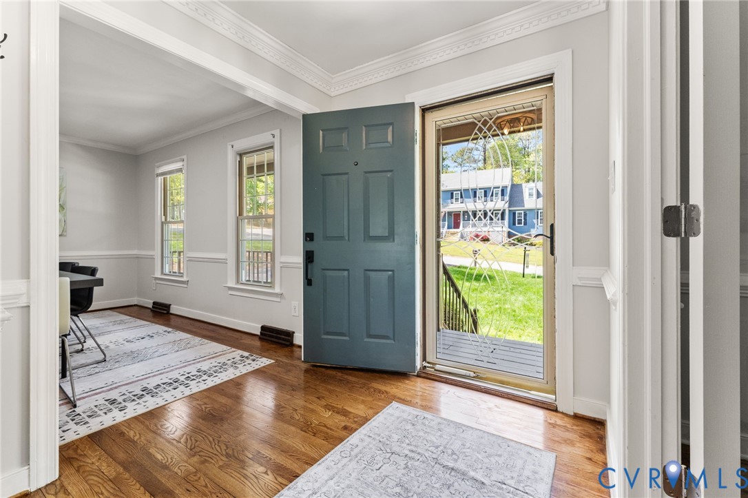12601 Cottage Mill Road Midlothian, VA 23114 - Photo 7 of 38 Foyer featuring dark wood-style flooring, crown mo