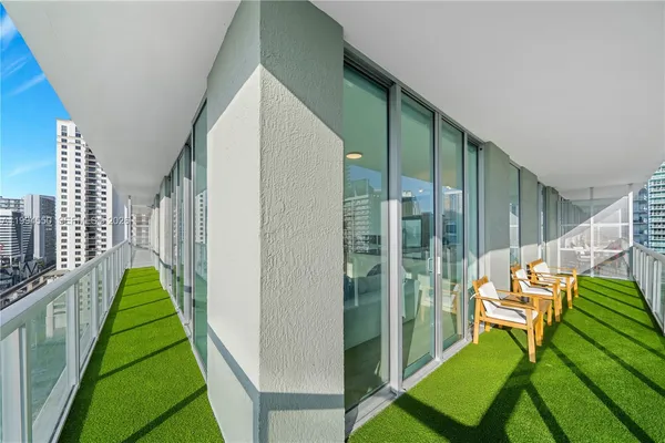 a garden view with a seating space