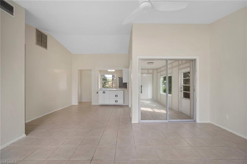 7423 Garry Road Fort Myers, FL 33967 - Photo 3 of 20 a view of a big room with wooden floor