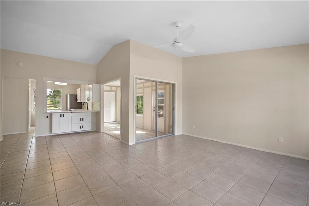 7423 Garry Road Fort Myers, FL 33967 - Photo 5 of 20 a view of a livingroom with a kitchen