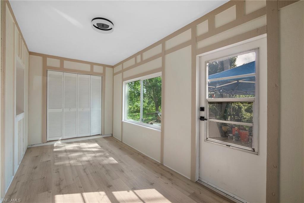 7423 Garry Road Fort Myers, FL 33967 - Photo 8 of 20 a view of an empty room with a window