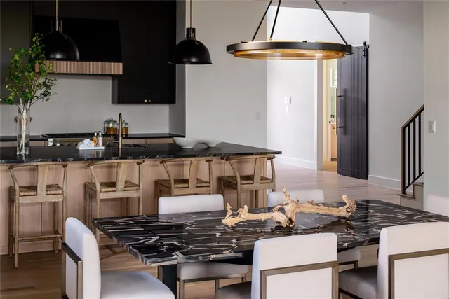 a kitchen with a stove and a refrigerator