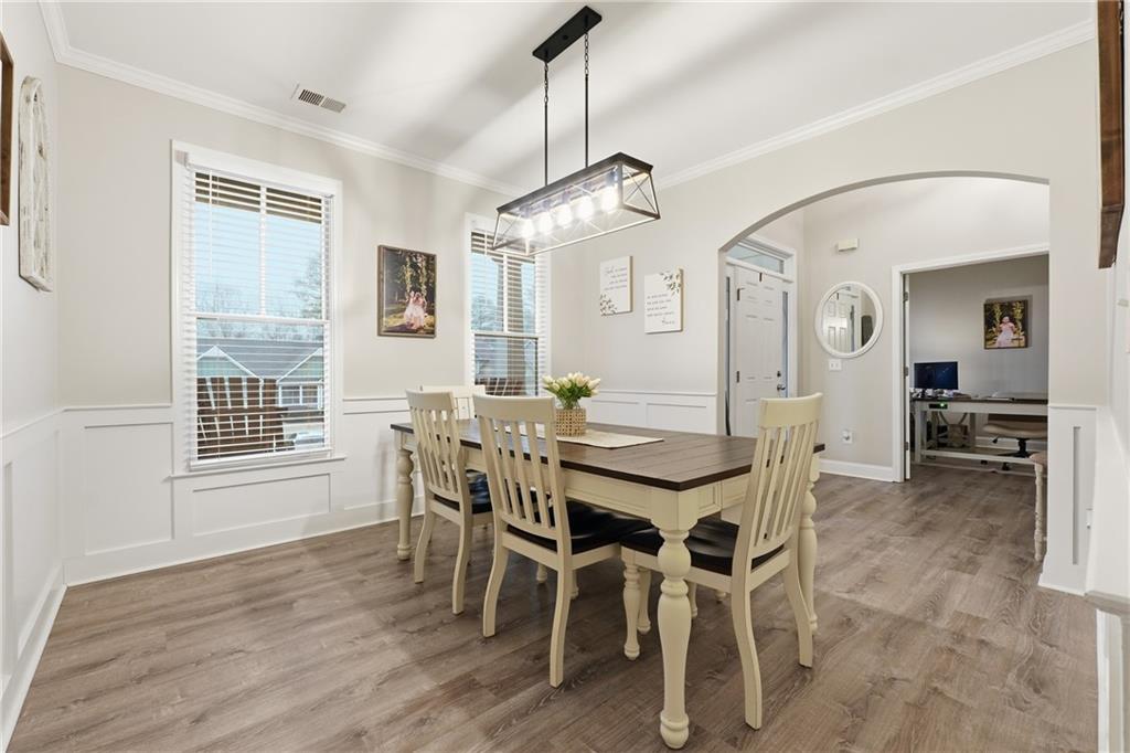 158 Pine Trail Dallas, GA 30157 - Photo 14 of 64 a view of a dining room with furniture window and wooden floor