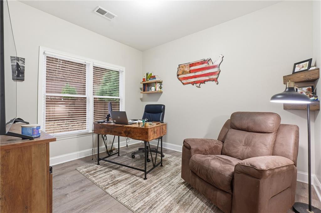 158 Pine Trail Dallas, GA 30157 - Photo 28 of 64 a work room with furniture wooden floor and a window