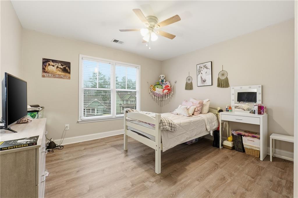158 Pine Trail Dallas, GA 30157 - Photo 43 of 64 a bed room with a bed and a window
