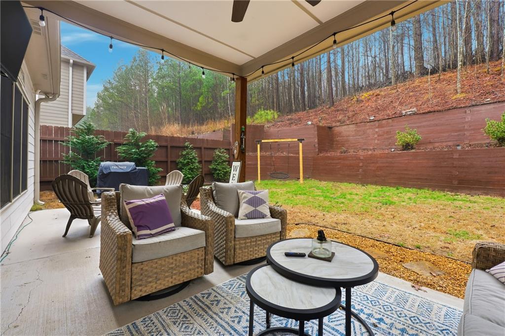 158 Pine Trail Dallas, GA 30157 - Photo 50 of 64 a outdoor living space with furniture and a rug