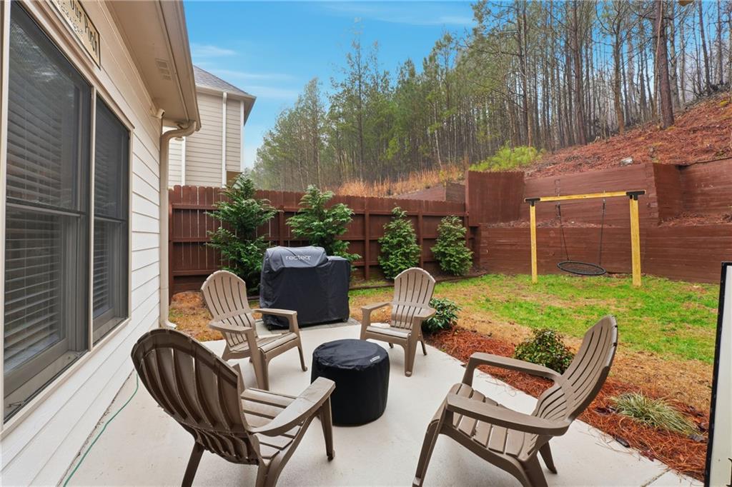 158 Pine Trail Dallas, GA 30157 - Photo 51 of 64 a view of a patio with couple of chairs