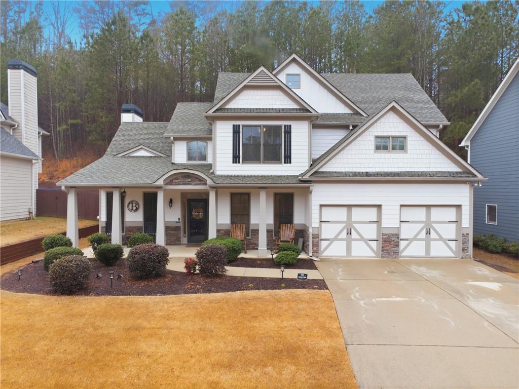 158 Pine Trail Dallas, GA 30157 - Photo 57 of 64 a front view of a house with garden