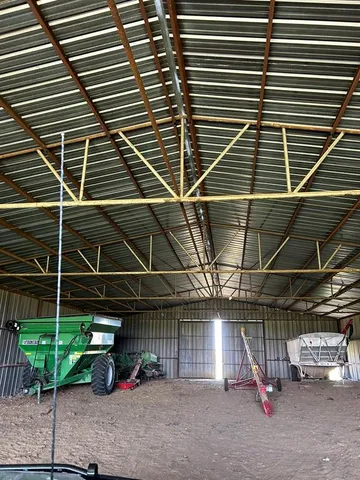 a view of a backyard of the house